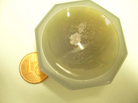 A fine powder evolved after comminution of the fabric with the Mini Mill.